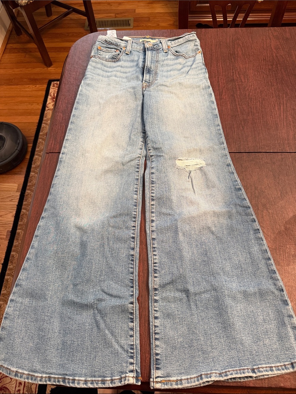 Levi's Light Wash Rib Cage Flared Jeans with Knee Distress